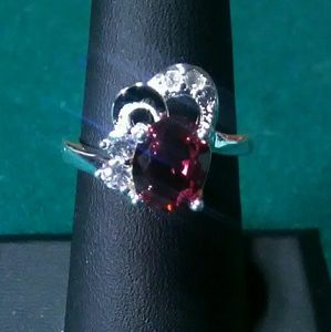 Red zircon oval cut ring
